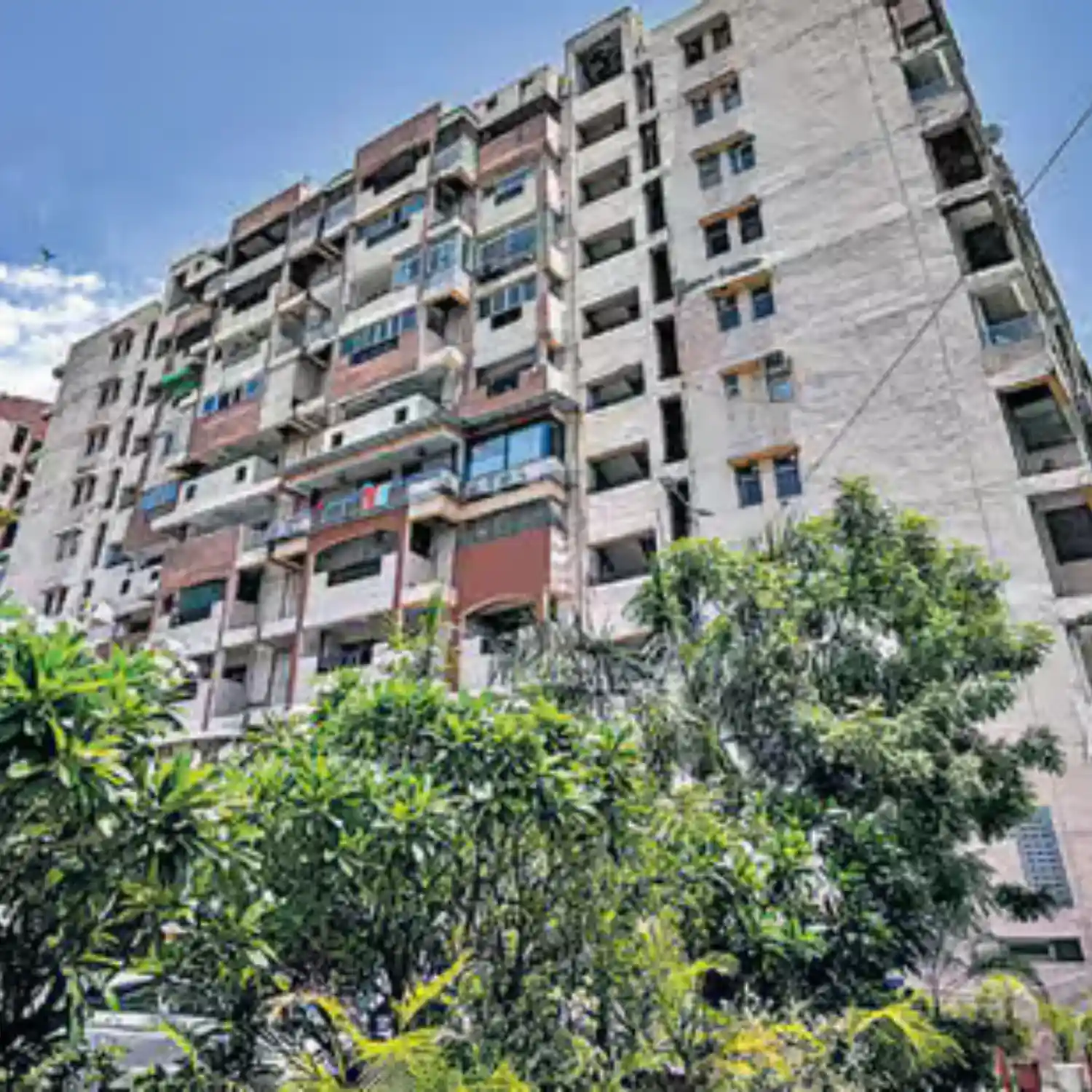 BTL activation setup by BrandLand at a residential apartment complex in Delhi with branded display and on-ground engagement activities.