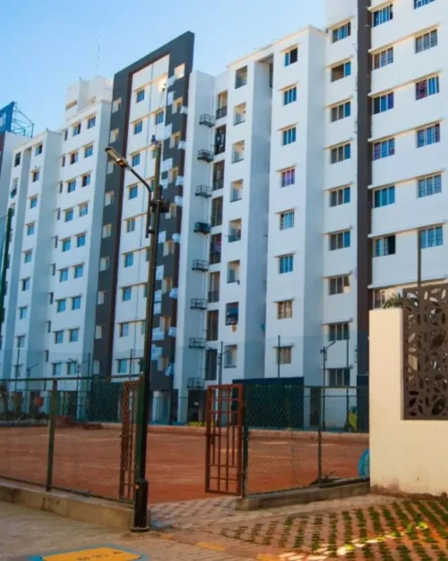 BTL activation setup by BrandLand at Adroit District, Chennai featuring branded installation in a residential complex courtyard.