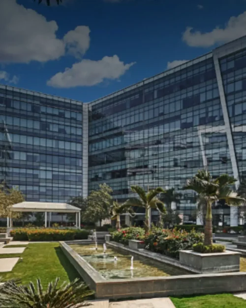 BTL activation setup by BrandLand at Embassy Tech Village, Bangalore featuring a modern glass corporate building backdrop.